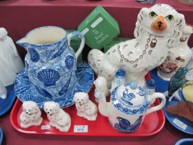 Moorland Pottery 'Shell' Patterned Jug and Plates, teapot and a Spaniel, together with two pairs