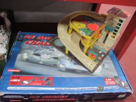 A Carrera Megaslot Racing Le Mans Challenge boxed set 1/32 scale together with a Fisher Price