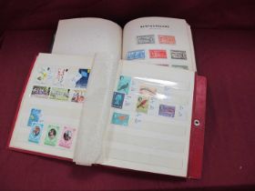 Stamps; A stock book containing British Commonwealth stamps early to modern, plus an album of mint