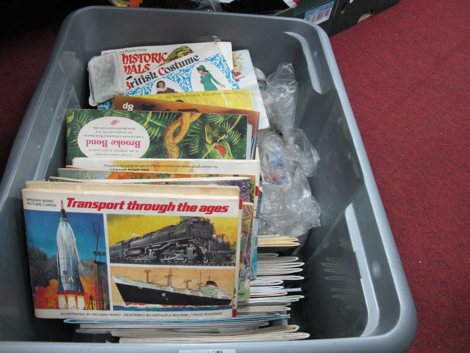 A Quantity of Cigarette Cards and Trade Cards, both loose and in albums.