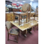 1920's Oak Drawleaf Table, together with four oak dining chars, with leather backs, drop in seats,