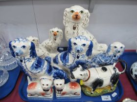 Moorland Pottery Cow Creamer, a pair of cats, a single larger Spaniel and one other:- One Tray.