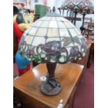 Tiffany Style Table Lamp, with twin branches and dragonfly themed shade. One glass panel with