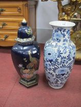 Oriental Style Jar and Cover, decorated with a peacock amongst peonies on wooden stand, together