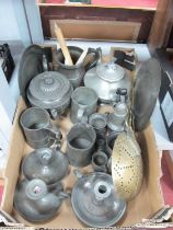 Pewter Tankards, plates, chambersticks, and metal ware:- One box.