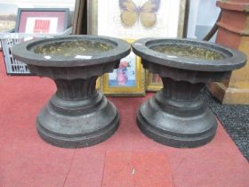 XIX Century Small Pair of Cast Iron Urns, with reeded columns, on stepped circular bases, 35cm