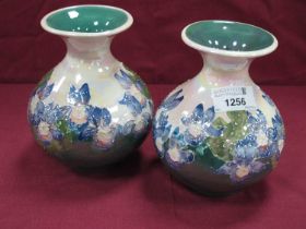 Two Lisa B Moorcroft for Moorland Pottery Baluster Vases, decorated with Iris on cream ground