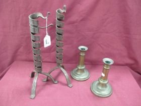 Pair of XIX Century Brass Candlesticks, 16cm high. An iron pair with adjustable candle levels