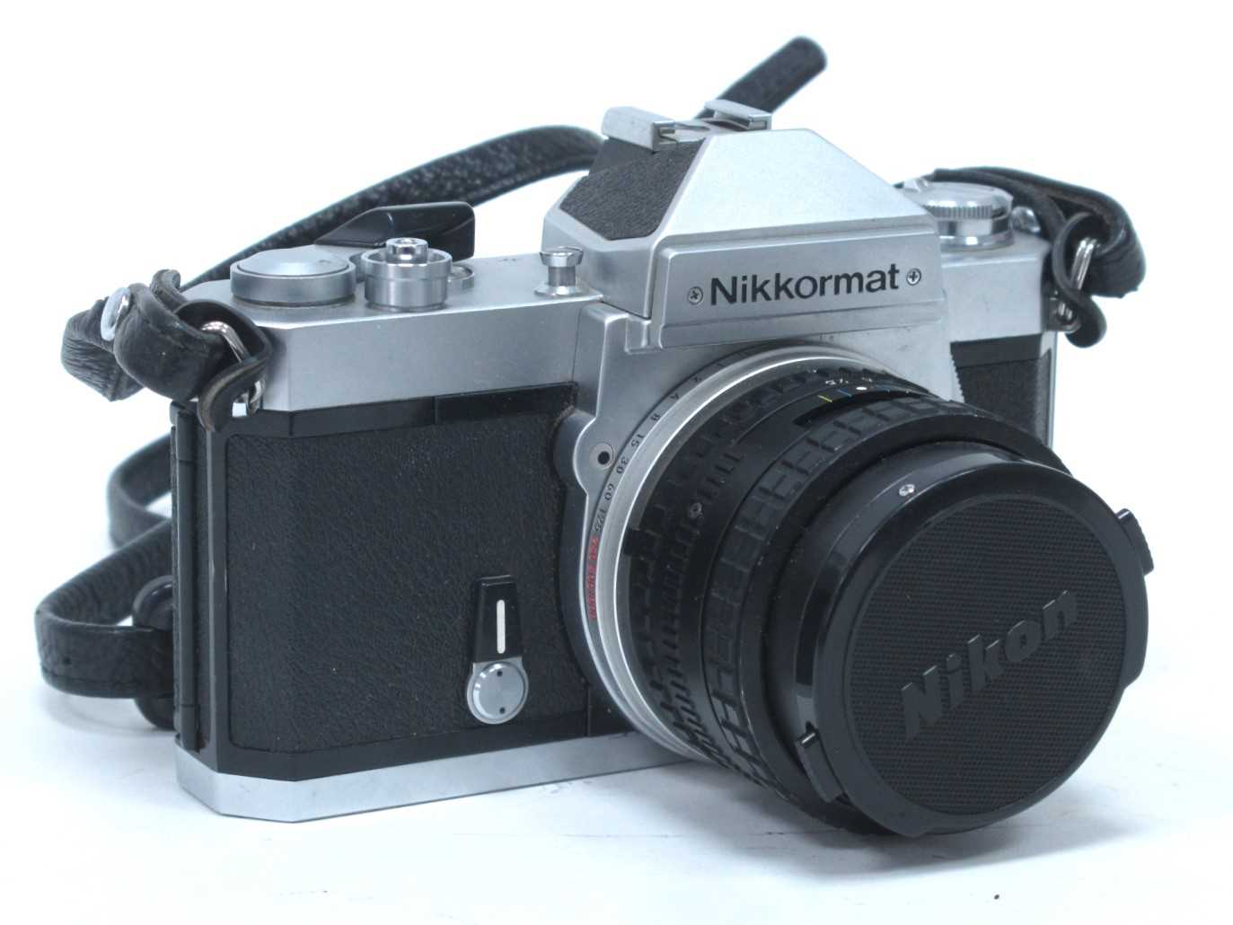Nikkormat F73 6085735 Camera, having 35mm lens. Camera untested, unable to confirm in working
