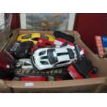 A large collection of metal and plastic model cars of varied scale largest 1/14 from Maisto, Hasbro,