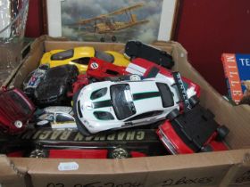 A large collection of metal and plastic model cars of varied scale largest 1/14 from Maisto, Hasbro,