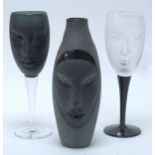 Mats Jonasson ; A pair of 'Elektra' Wine Glasses, one in black on a clear stem, the other frosted
