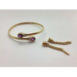 A 9ct Gold Ladies Bangle, with rubover and inset detail, together with a pair of rope twist style