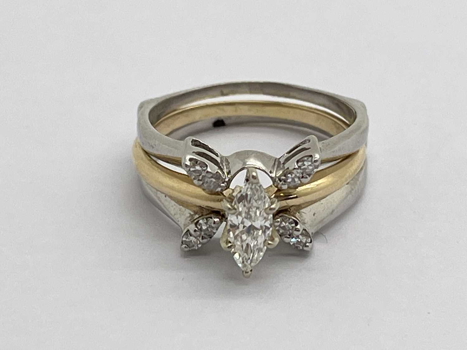 A Modern Marquise Cut Diamond Single Stone Diamond Ring, high claw set (finger size N), fitted