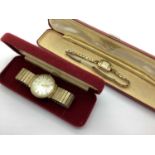 Marvin; A 9ct Gold Cased Ladies Wristwatch, the signed rectangular dial with arabic numerals and