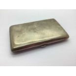 A Hallmarked Silver Cigarette Case, (marks part obscured), of plain form, 13cm.