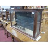 A Victorian Shop Display Counter Cabinet, with later signage for 'Kemp's Pharmacy Ltd Chemists and