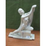 Art Deco Painted Plaster Figure of Scantily Clad Female, her left knee on block and arms in offering