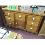 XIX Century and Later Pine Dresser Base, with seven small drawers, central cupboard door, on