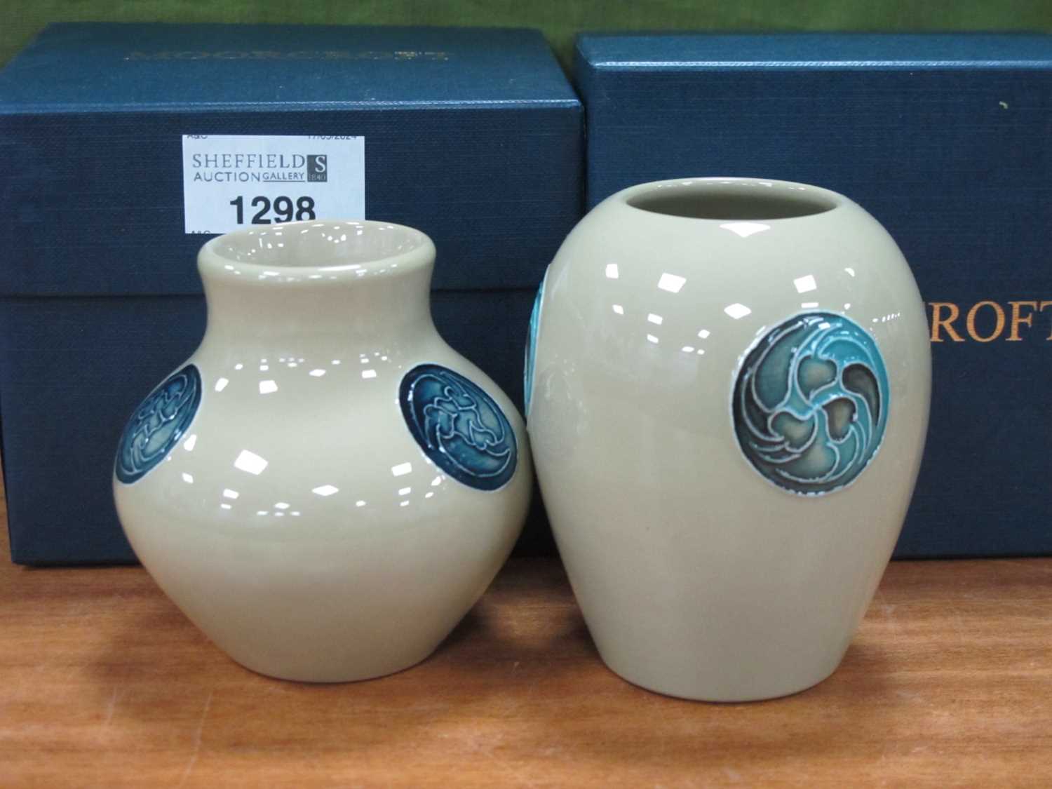 A Moorcroft Pottery Ovoid Vase, painted in the 'Flamminian' design on a celadon ground, impressed