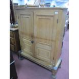 XIX Century Pine Cupboard, with twin panelled doors, two internal drawers, on a later stand. Pine