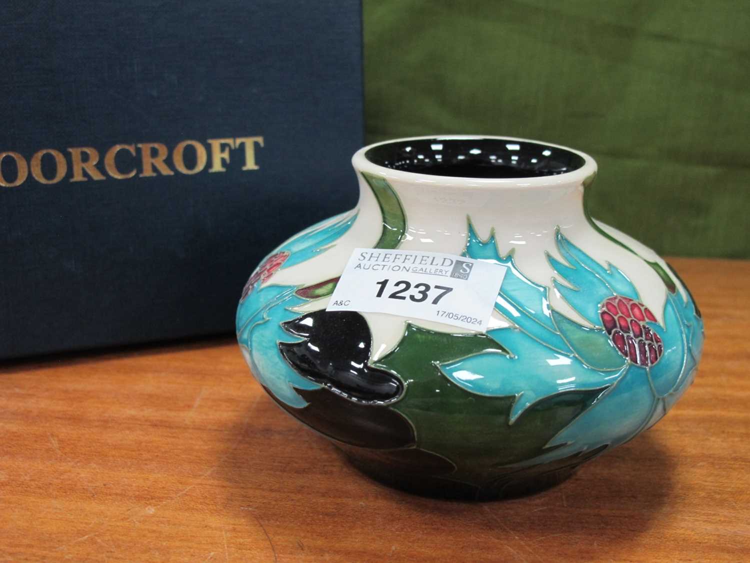 A Moorcroft Pottery 'Sea Holly' Pattern Squat Baluster Vase, designed by Emma Bossons, impressed and