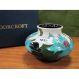 A Moorcroft Pottery 'Sea Holly' Pattern Squat Baluster Vase, designed by Emma Bossons, impressed and
