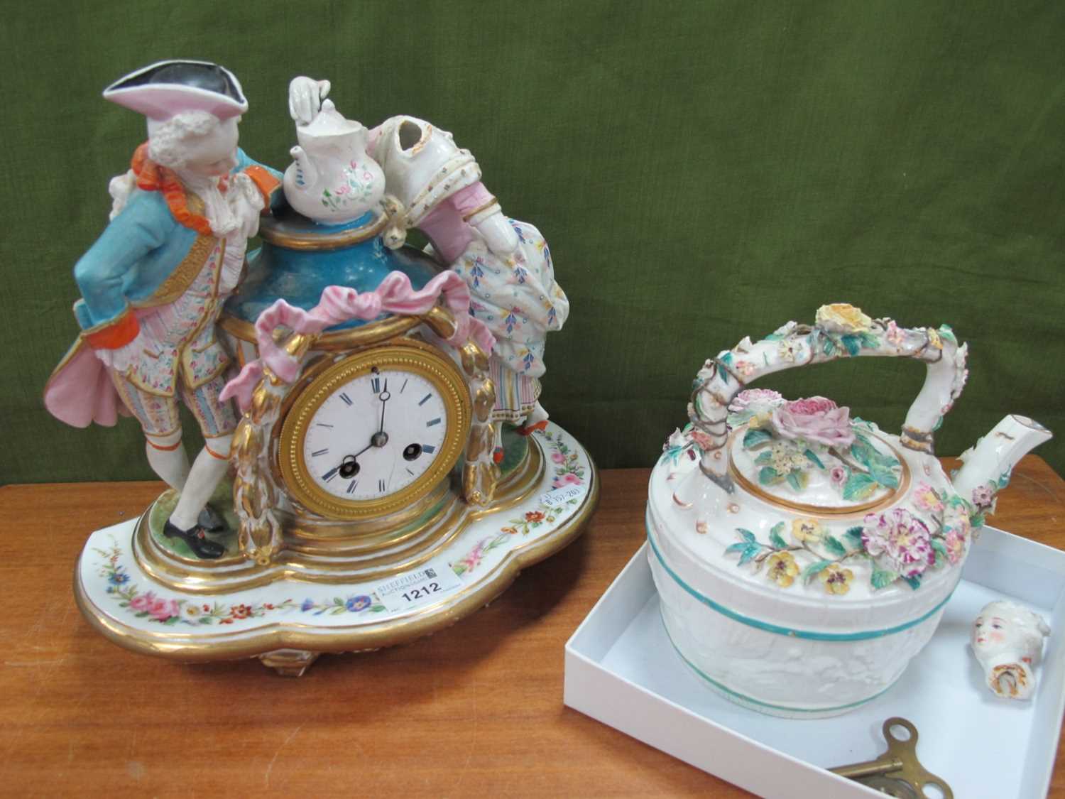 XIX Century French Porcelain Mantel Clock, decorated with two figures, central dial (damaged),