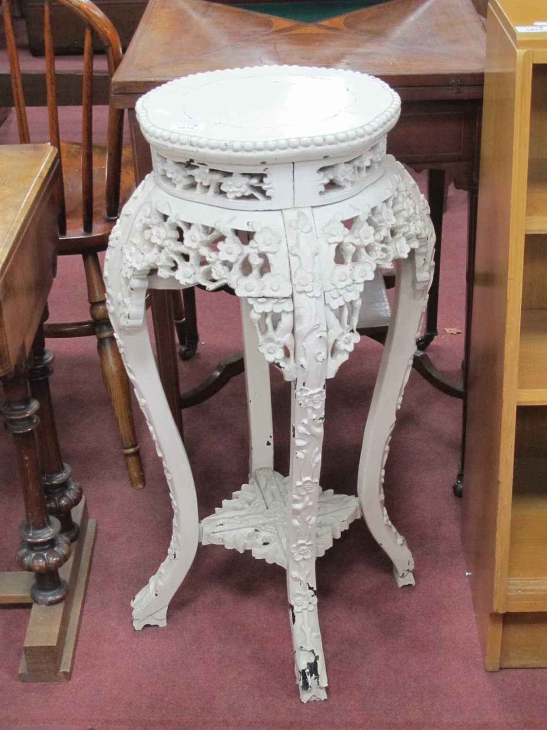 Oriental Hardwood Plant Stand, circa early XX Century, carved with lotus blossom, sabre legs, marble