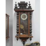 XIX Century Vienna Wall Clock, with an applied pediment, split pilasters, arched door, white