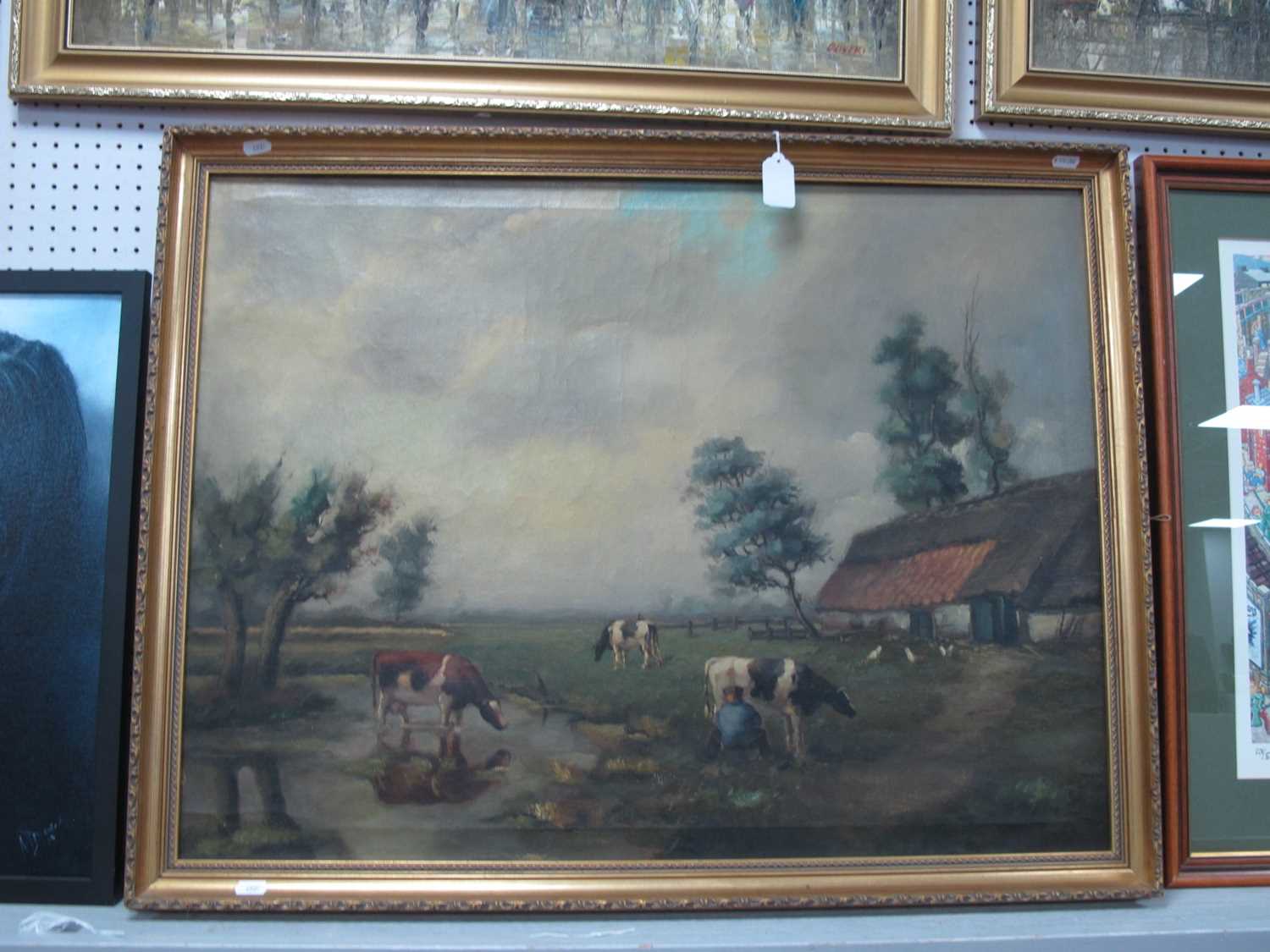 XX Century Continental Scene, Farmyard with farmer milking a cow, oil on canvas, signed lower