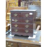 A Victorian Miniature Apprentice Style Chest of Five Drawers (two over three) all with original