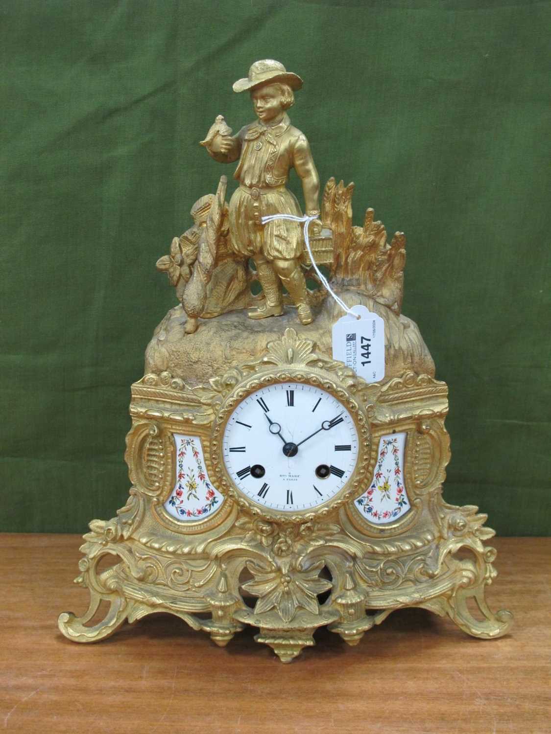 French Gilt Metal Cased Mantle Clock, with bird fancier atop, eight-day movement Hry Marc a Paris,