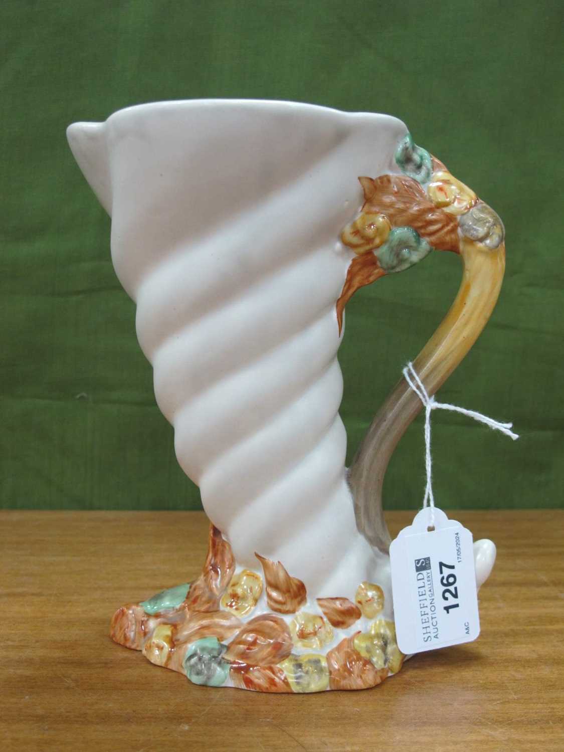 A Clarice Cliff Cornucopia Jug Vase, 18cm high.