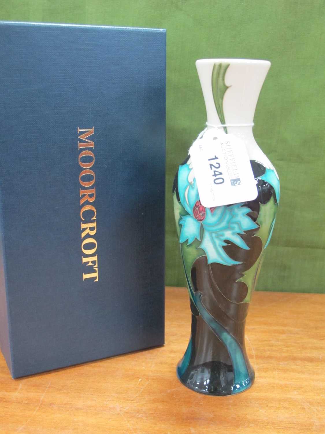 A Moorcroft Pottery 'Sea Holly' Pattern Baluster Vase, designed by Emma Bossons, impressed and
