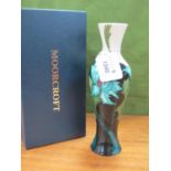 A Moorcroft Pottery 'Sea Holly' Pattern Baluster Vase, designed by Emma Bossons, impressed and