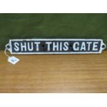 An Original Circa 1940's Cast Iron Level Crossing Sign, 'Shut This Gate', 43cm wide.