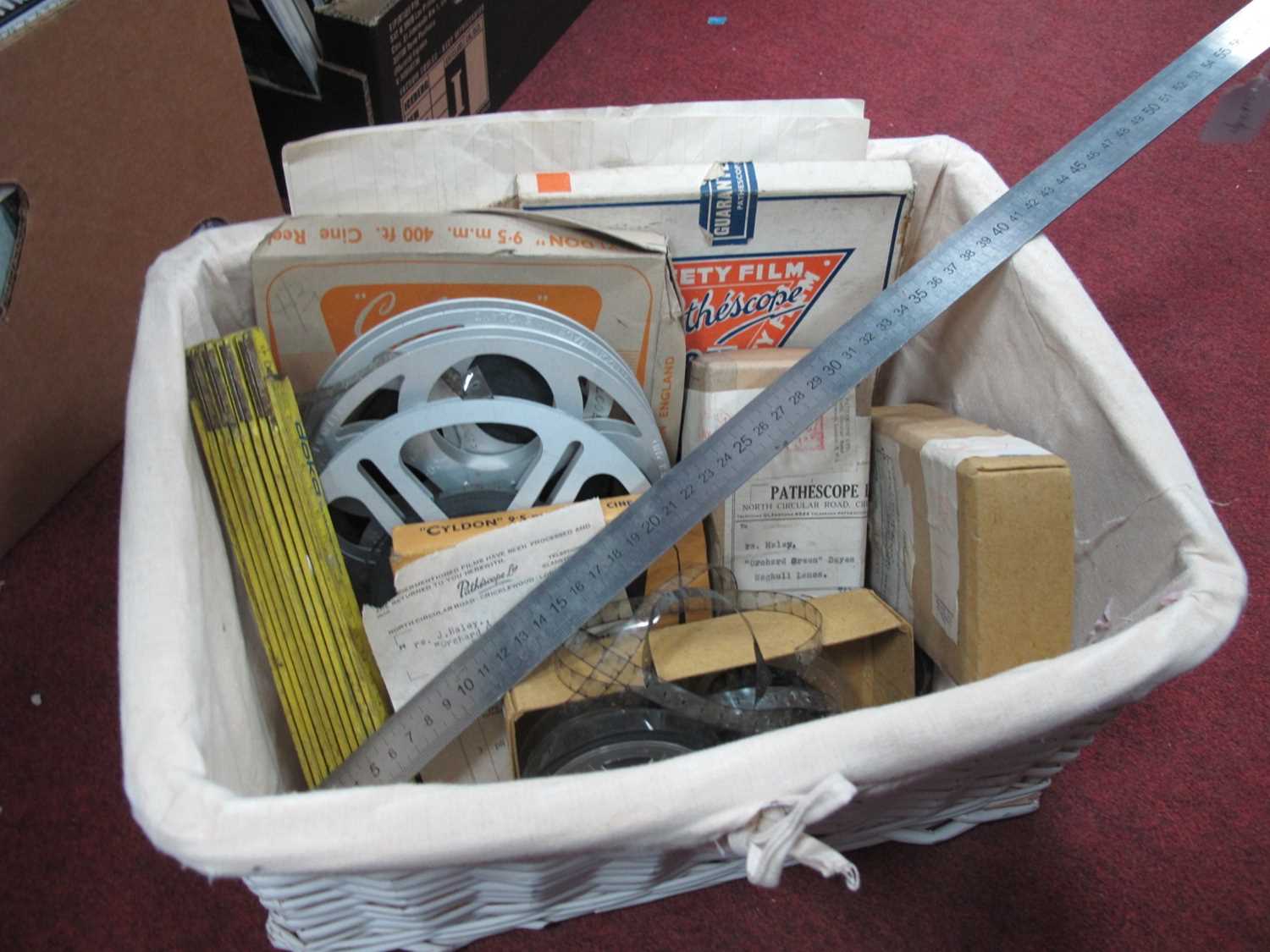 Vintage Film Cine Reels, steel ruler, Doka folding ruler, Baby Cinecamera Film box and another,