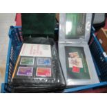 Stamps; Two cover albums containing Great Britain presentation packs and prestige booklets with a