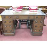 XIX Century Oak Pedestal Desk, with a crossbanded top, brown leather scriver, three drawers, twin