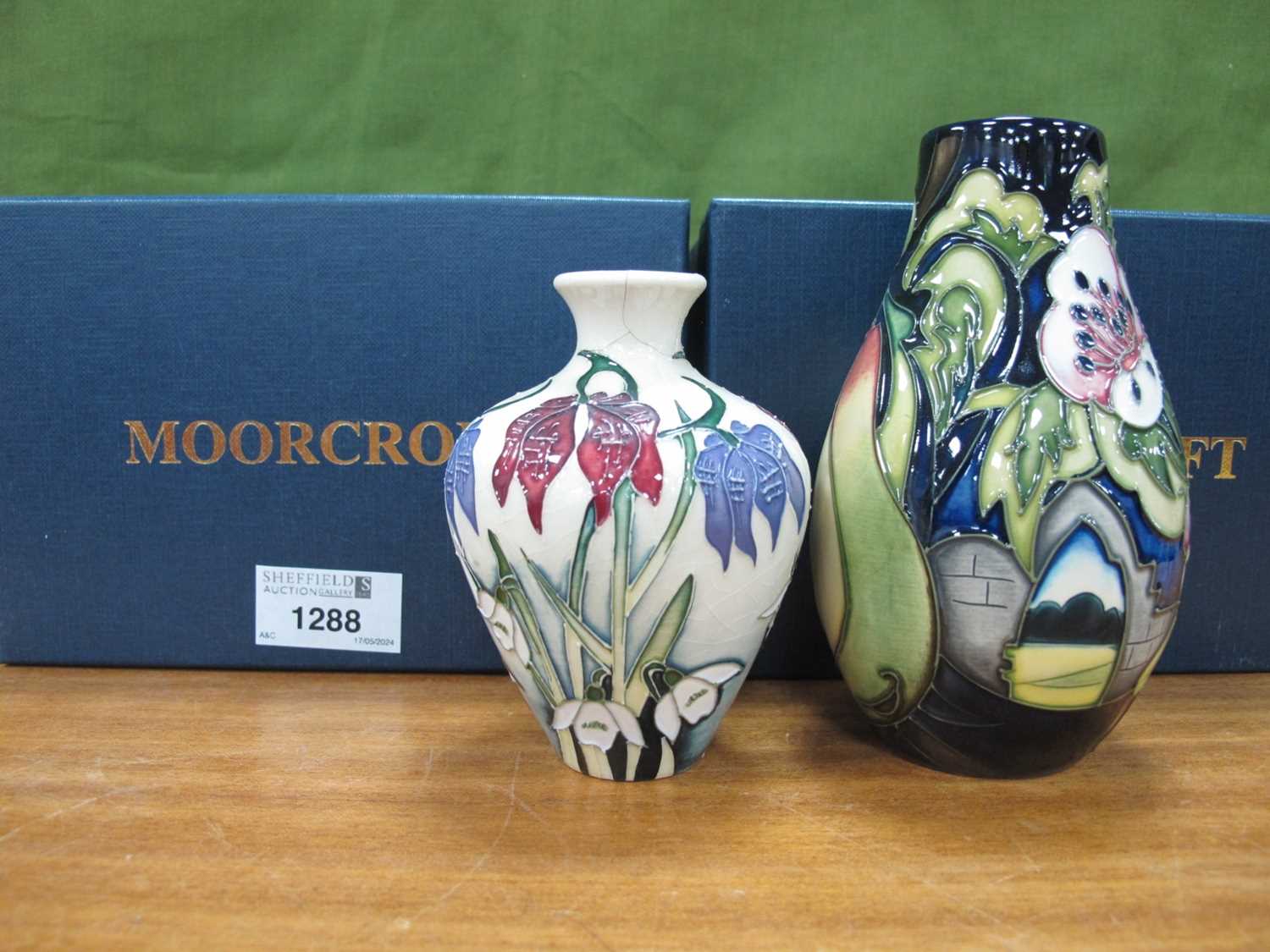 A Moorcroft Pottery Ovoid Vase, painted with a design of pears and flowers, designed by Emma