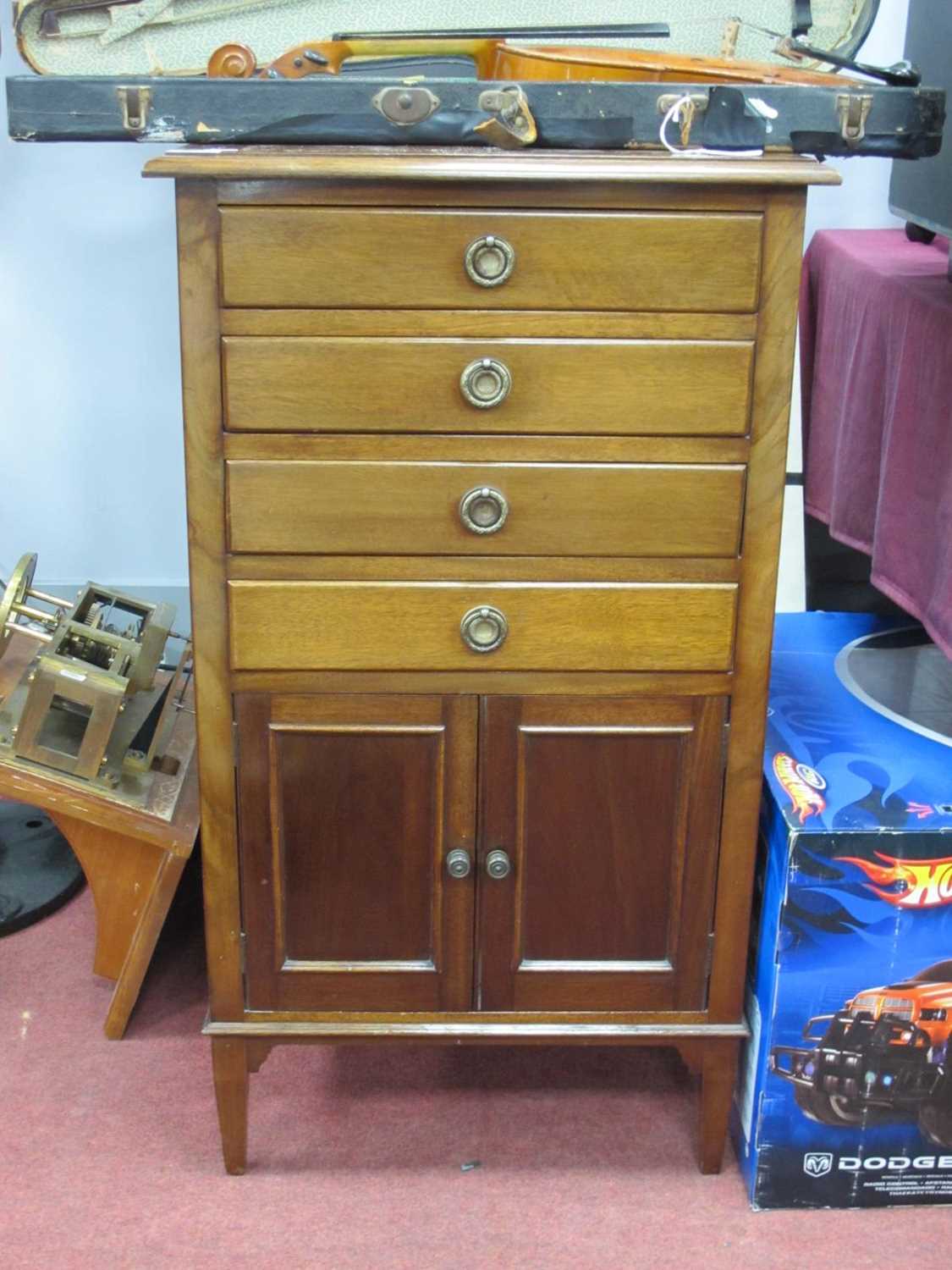 1920s Mahogany Music Cabinet, with low back, four fall front drawers over cupboard doors, on