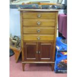 1920s Mahogany Music Cabinet, with low back, four fall front drawers over cupboard doors, on