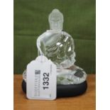 A Swarovski Crystal Model of the Guatama Buddha, sitting on a matt black crystal base, designed by