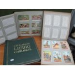 Three Albums of Early XX Century Liebig Advertising Cards, containing a total of 750 cards in sets