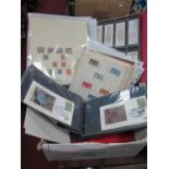 Stamps; An accumulation of mainly Great Britain and British Commonwealth stamps in albums and on