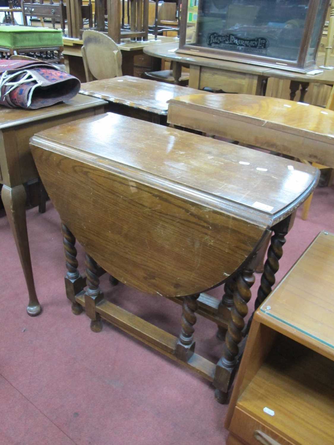 Oak Oval Topped Drop Leaf Gateleg Table, on barley twist supports, 71cm high.