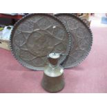 Large Copper Charger, embossed with Adam and Eve to centre, 60cm diameter, another similar Middle