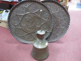 Large Copper Charger, embossed with Adam and Eve to centre, 60cm diameter, another similar Middle