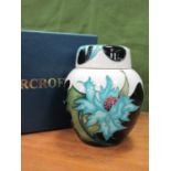 A Moorcroft Pottery 'Sea Holly' Pattern Ginger Jar and Cover, designed by Emma Bossons, impressed